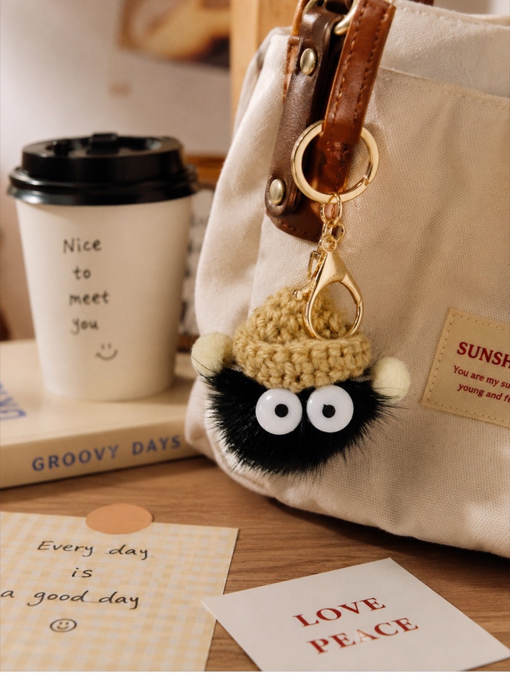 Handmade Cute Black Fuzzy Pom Keychain with Beige Crochet Hat